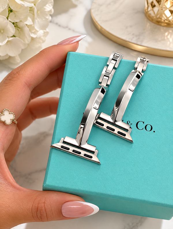 Customer wearing a silver smart watch band
