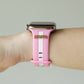 Smartwatch with a pink band labeled 'mama' on a neutral background