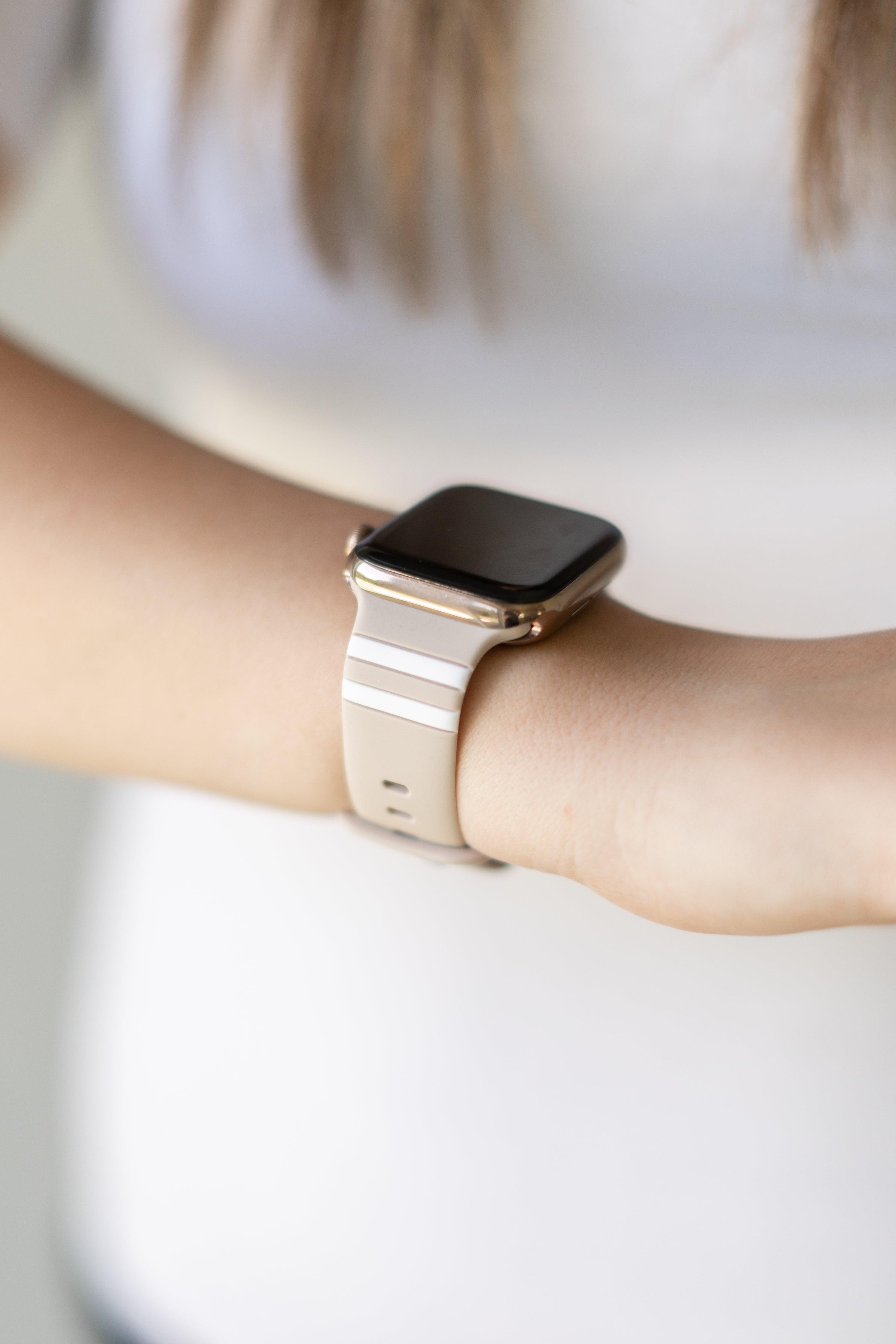 White apple watch online on wrist